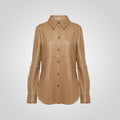 Tan leather shirt on a white background