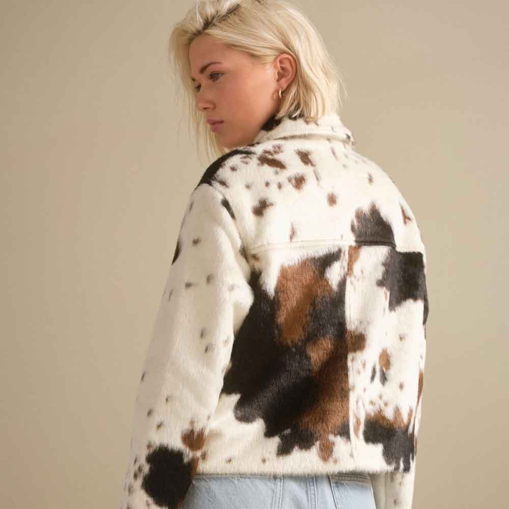 Genuine cowhide leather jacket for women with zip-through front and natural hide markings