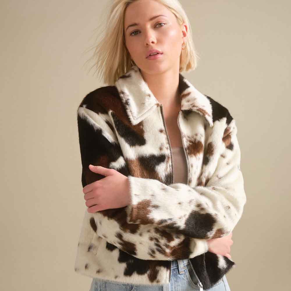 Genuine cowhide leather jacket for women with zip-through front and natural hide markings