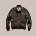 Brown leather jacket with two front pockets on a beige background