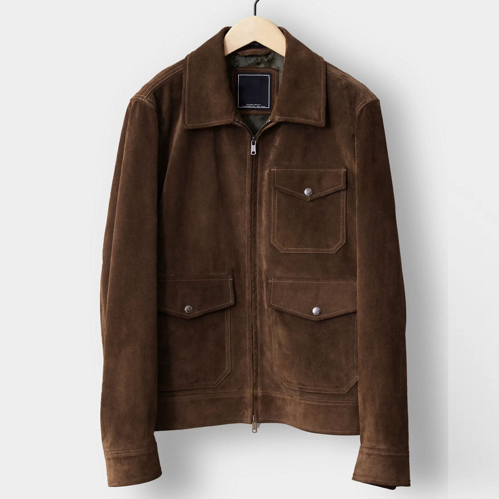 brown suede jacket hanging on hanger