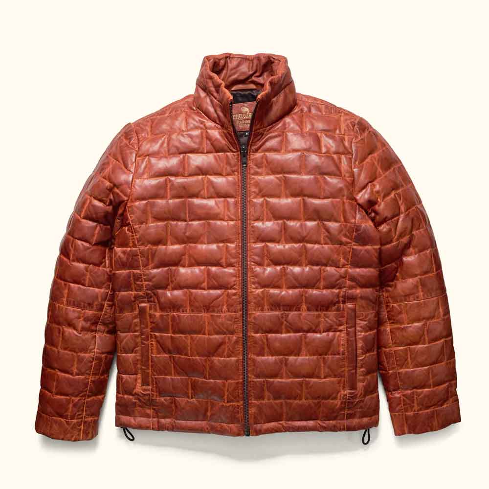 Brown quilted jacket on a white background